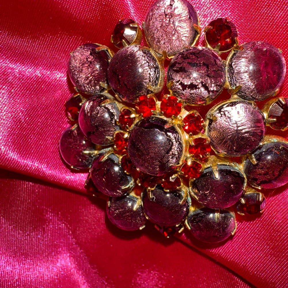 Pink and garnet red vintage brooch. Gorgeous!

Likely 1940-1970